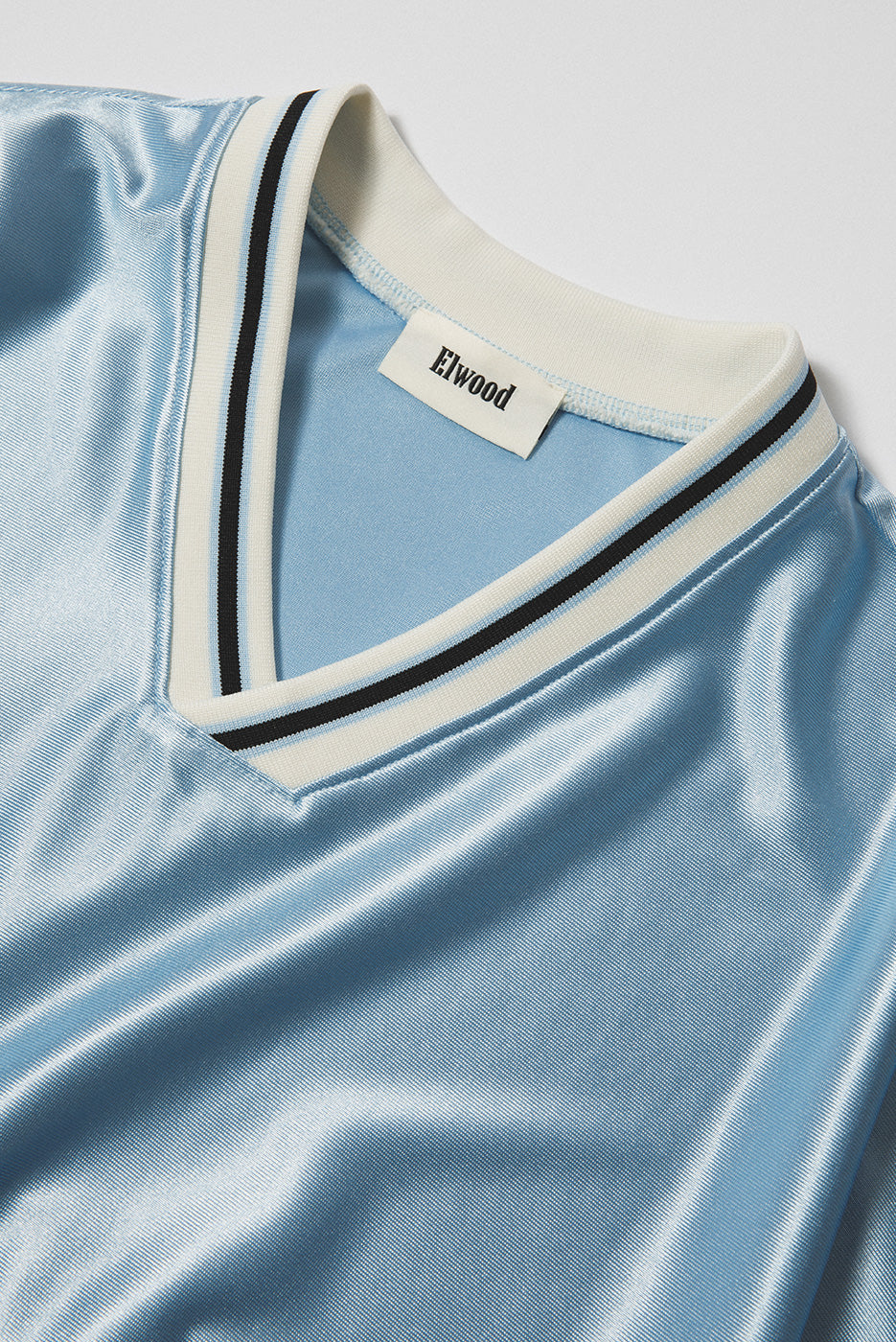VARSITY V NECK TEE